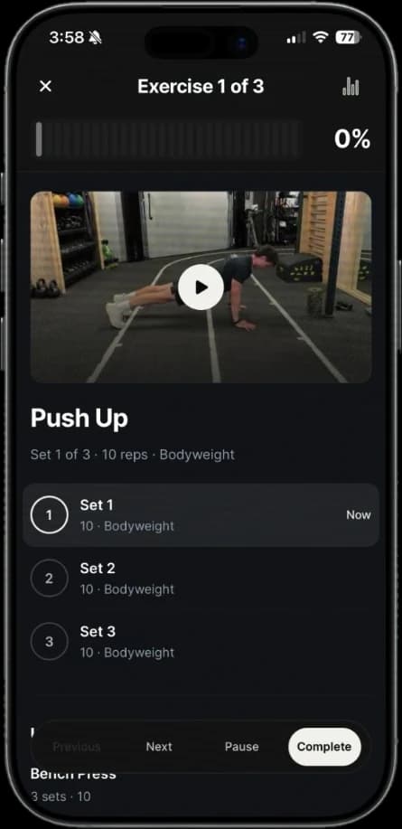 Adapt app exercise screen with a push up video and three sets to tick off